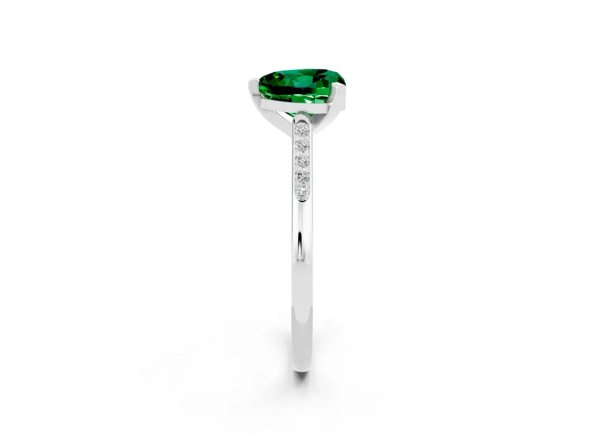 Heart Cut Emerald Solitaire Ring with Channel Set Round Band and Prong Setting Silver