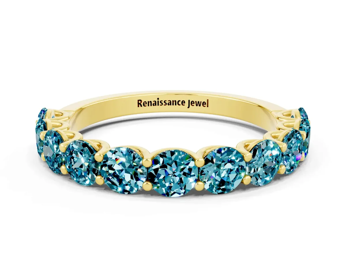 Round Blue Topaz Shared Prong Eternity Band Yellow gold