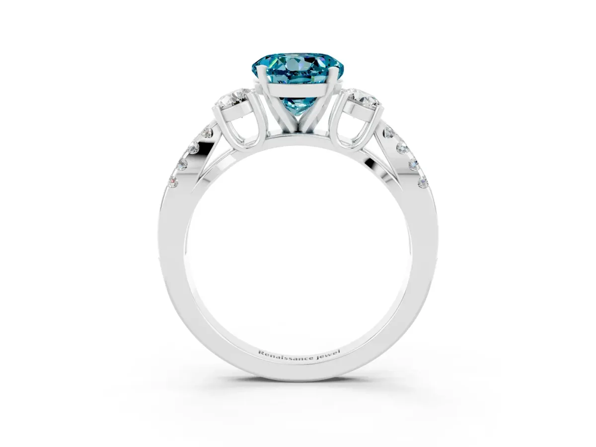 Round Cut Blue Topaz Three-Stone Ring with Pavé Split Shank and Four-Prong Setting Silver