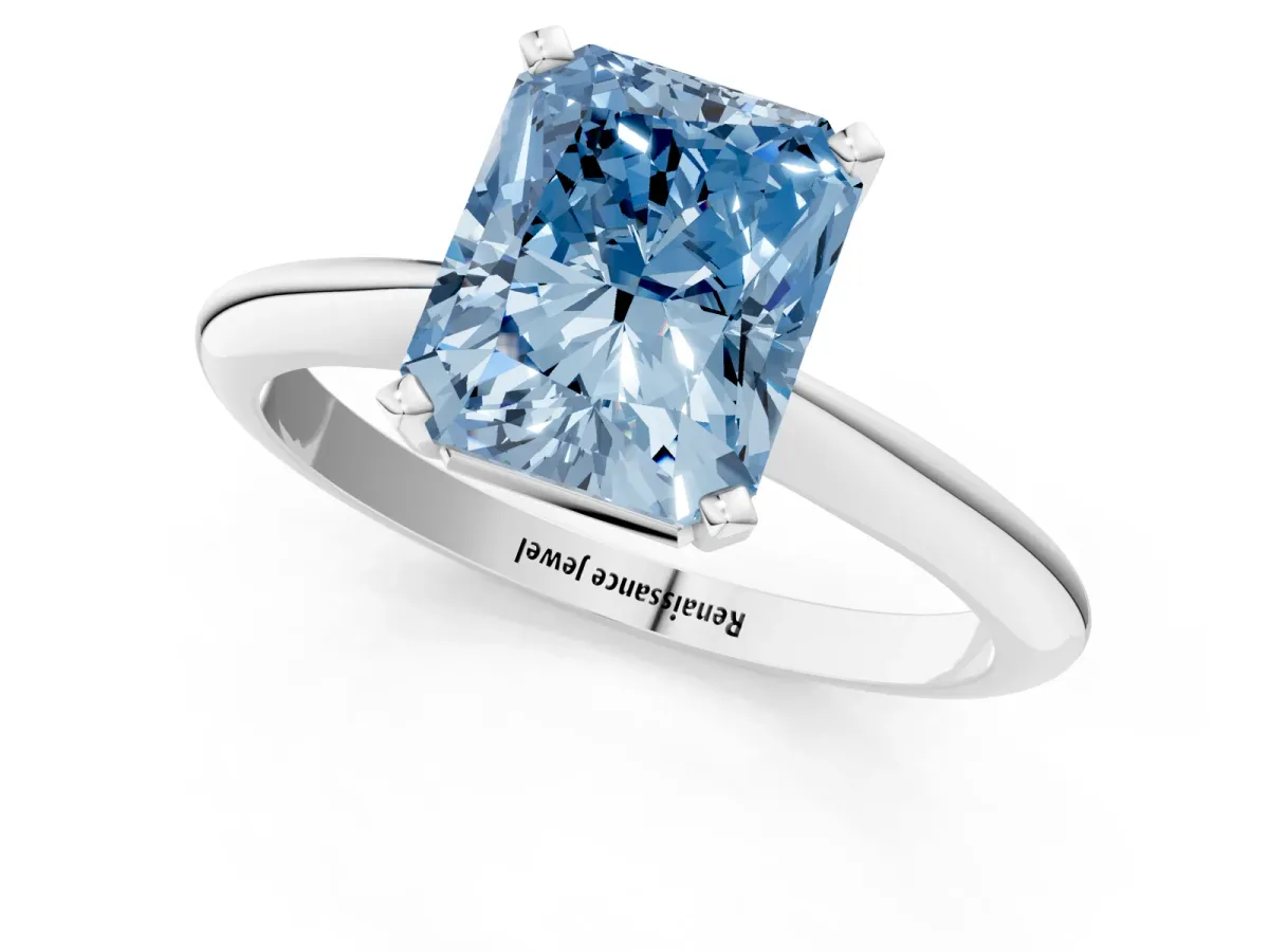 Fancy Blue Radiant Cut Cut Solitaire Ring with Four-Prong Setting on a Classic Band Platinum