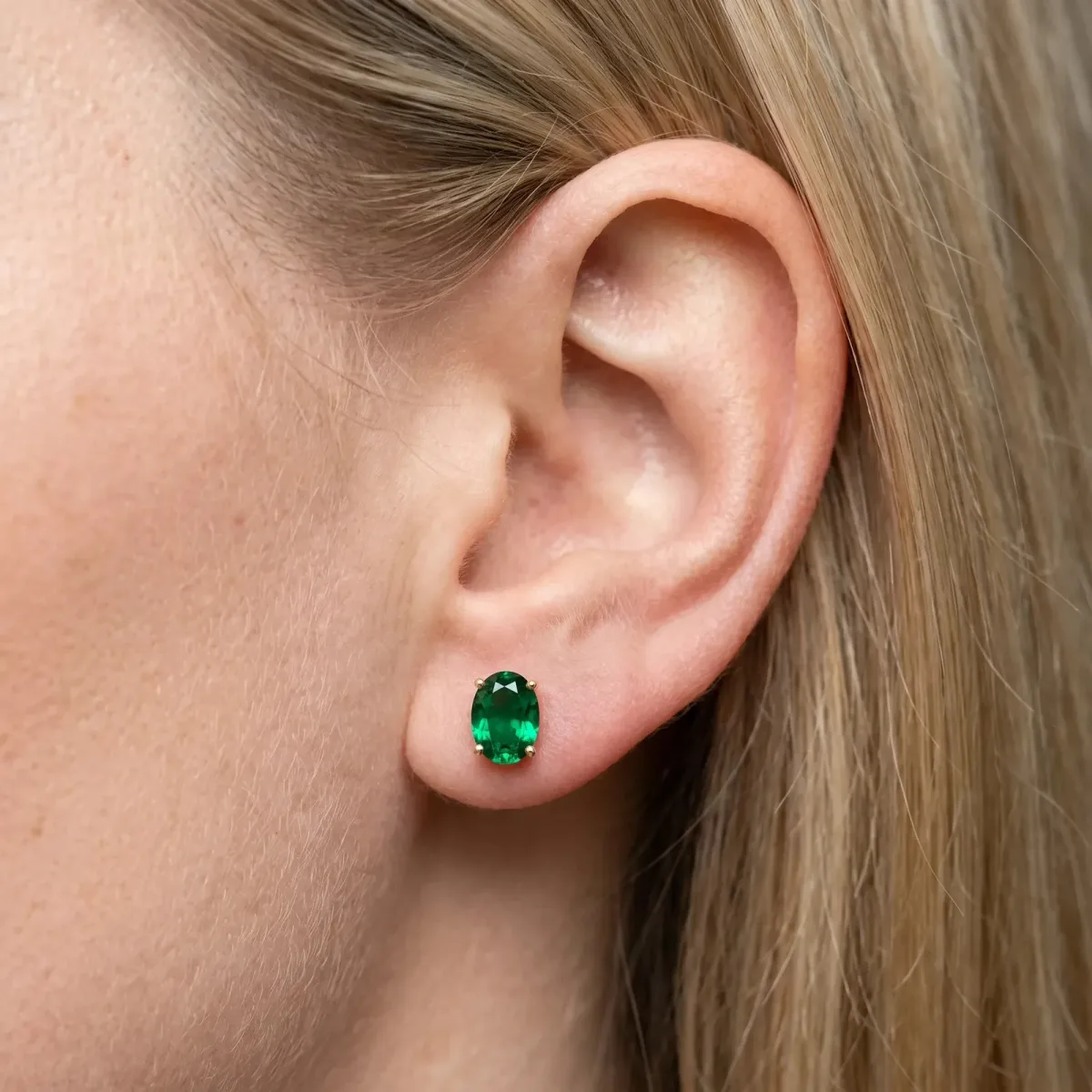 Oval Cut Emerald Stud Earrings Yellow gold