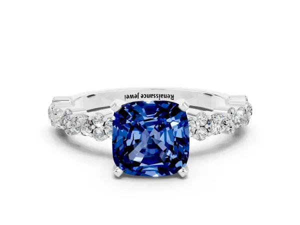 Cushion Cut Blue Sapphire Side Stone Solitaire Ring with Round and Four-Prong Setting Platinum