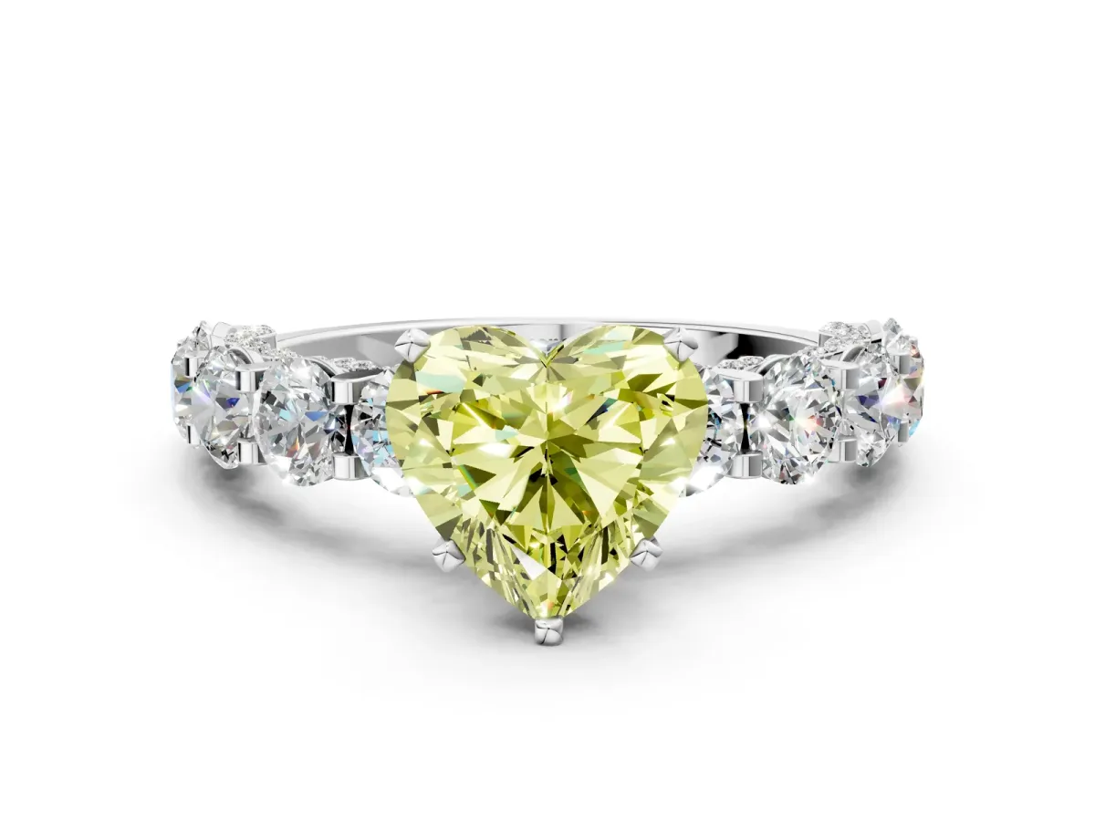 Fancy Yellow Heart Cut Diamond Side Stone Engagement Ring with Four-Prong Setting Platinum