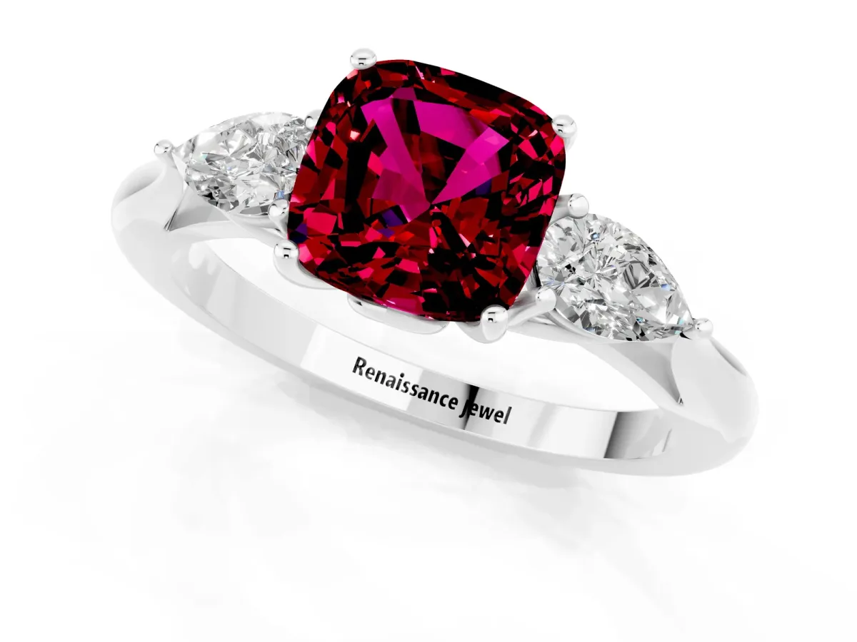 Three-Stone Cushion Cut Garnet Ring with Pear Side Stones in Four-Prong Setting White gold