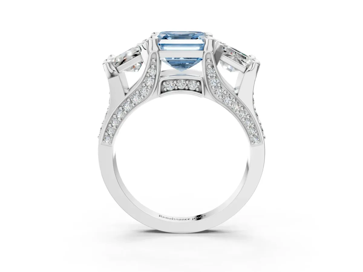 Fancy Blue Asscher Cut Diamond Three-Stone Ring with Channel Set Band and Four-Prong Setting Platinum
