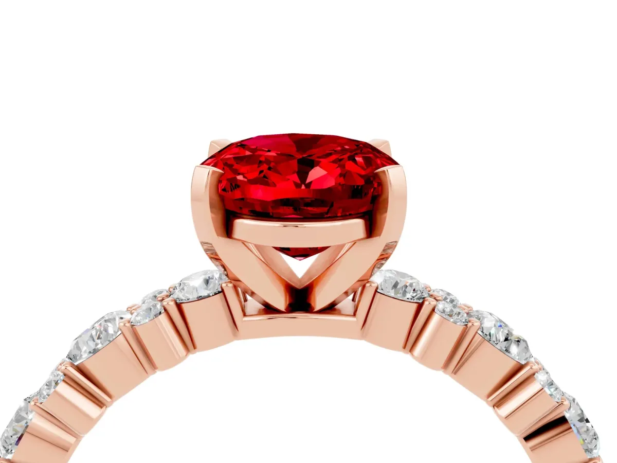 Oval Cut Ruby Side Stone Solitaire Ring with Round and Four-Prong Setting Rose gold