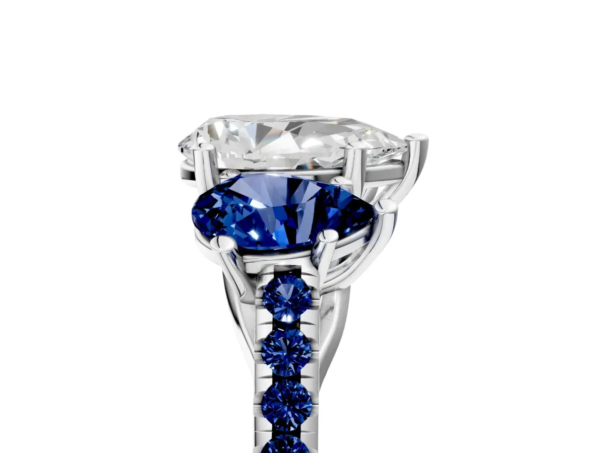 Three-Stone Pear Cut Diamond Ring with Round Blue Sapphire Pavé Band and Prong Setting Silver
