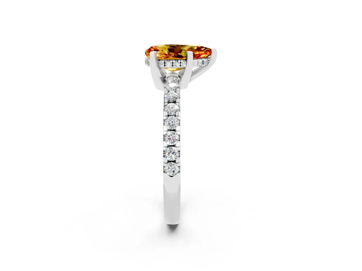 Pear Cut Citrine Solitaire Ring with Round Pavé Band and Four-Prong Setting Silver