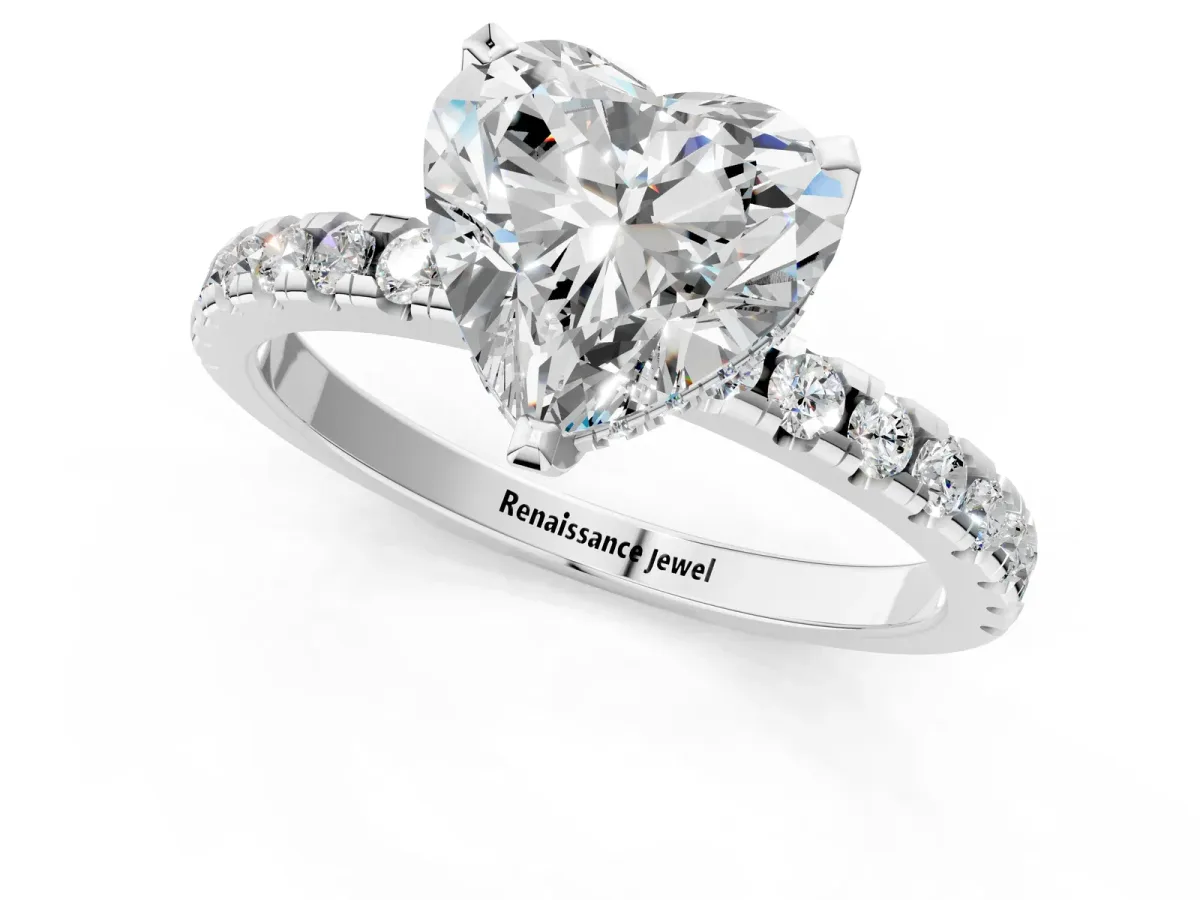 Heart Cut Diamond Solitaire Ring with Round Pavé Band and Four-Prong Setting Silver
