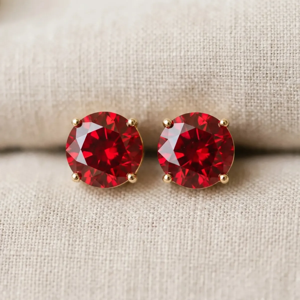 Round Cut Ruby Stud Earrings Yellow gold