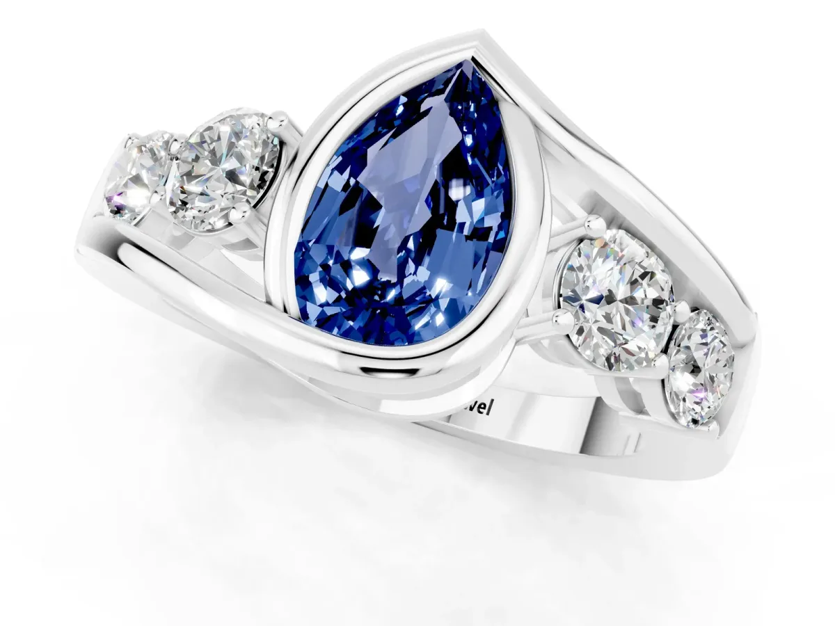 Bezel Set Pear Cut Blue Sapphire Bypass Ring with Round Accents Silver