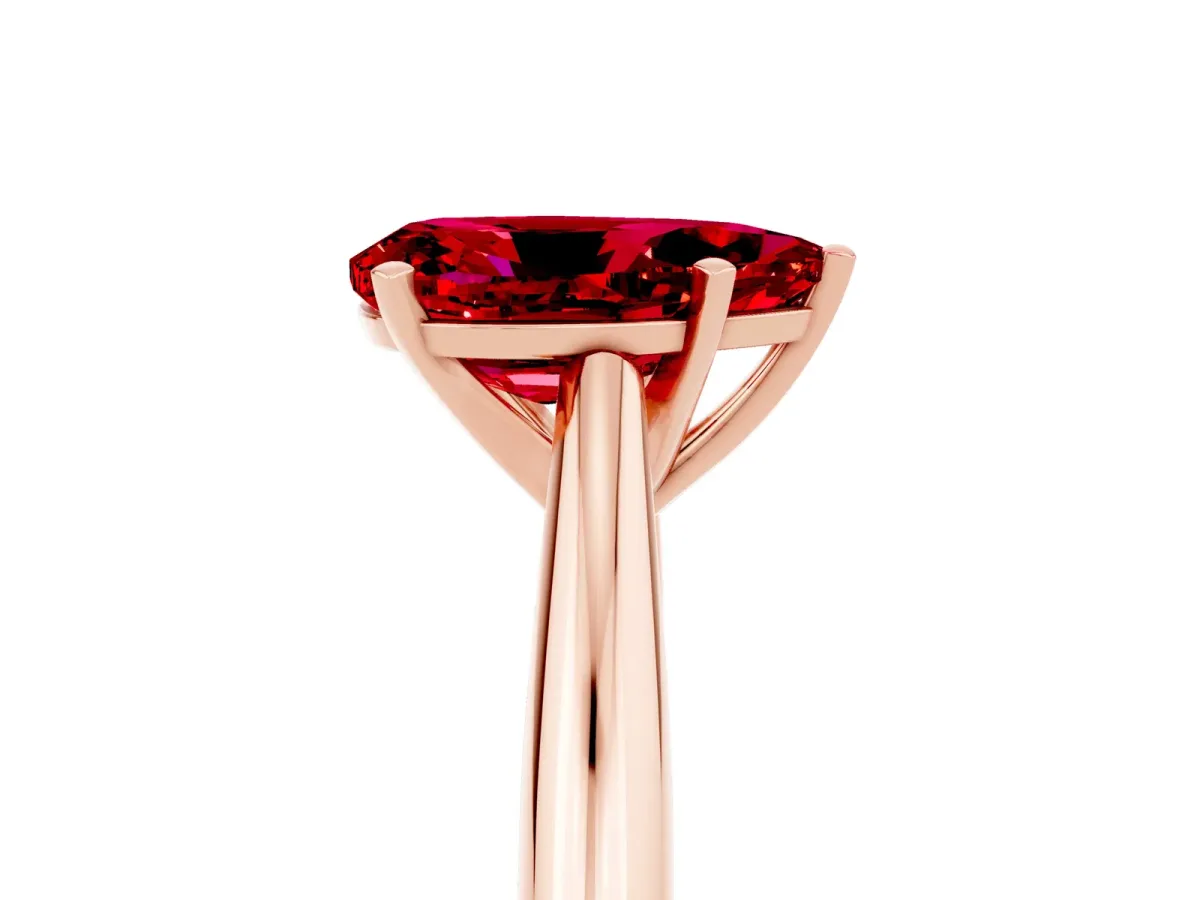 Pear Cut Ruby Solitaire Engagement Ring with Cathedral Setting and Four-Prong Mount Rose gold