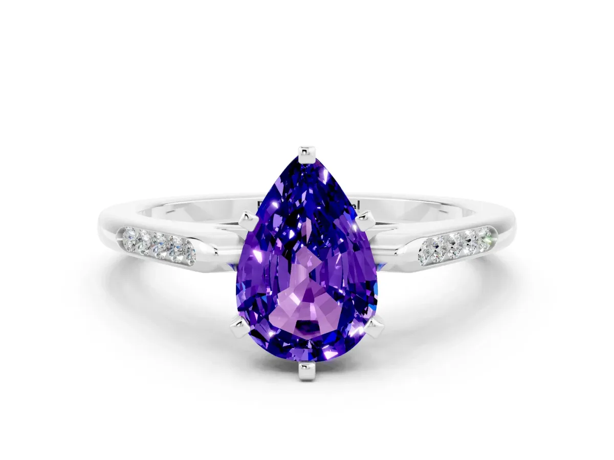 Pear Cut Tanzanite Solitaire Ring with Channel Set Round Band and Prong Setting Silver