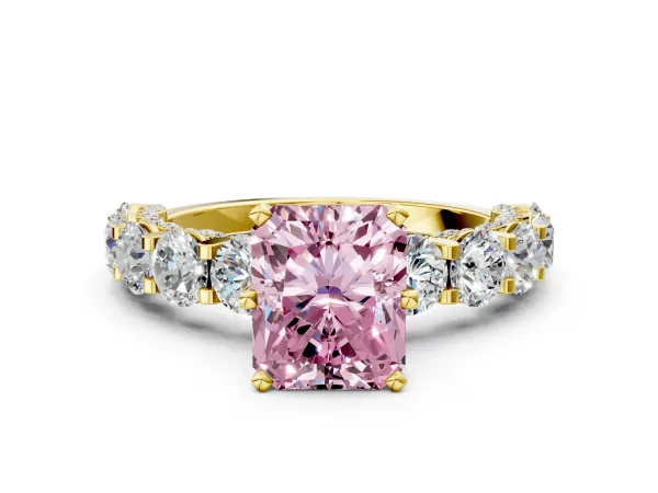 Fancy Pink Radiant Cut Diamond Side Stone Engagement Ring with Four-Prong Setting Yellow gold
