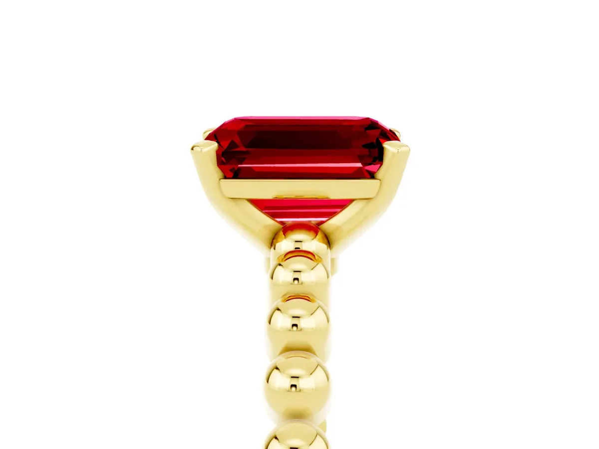 Emerald Cut Ruby Solitaire Ring with Beaded Band and Prong Setting Yellow gold