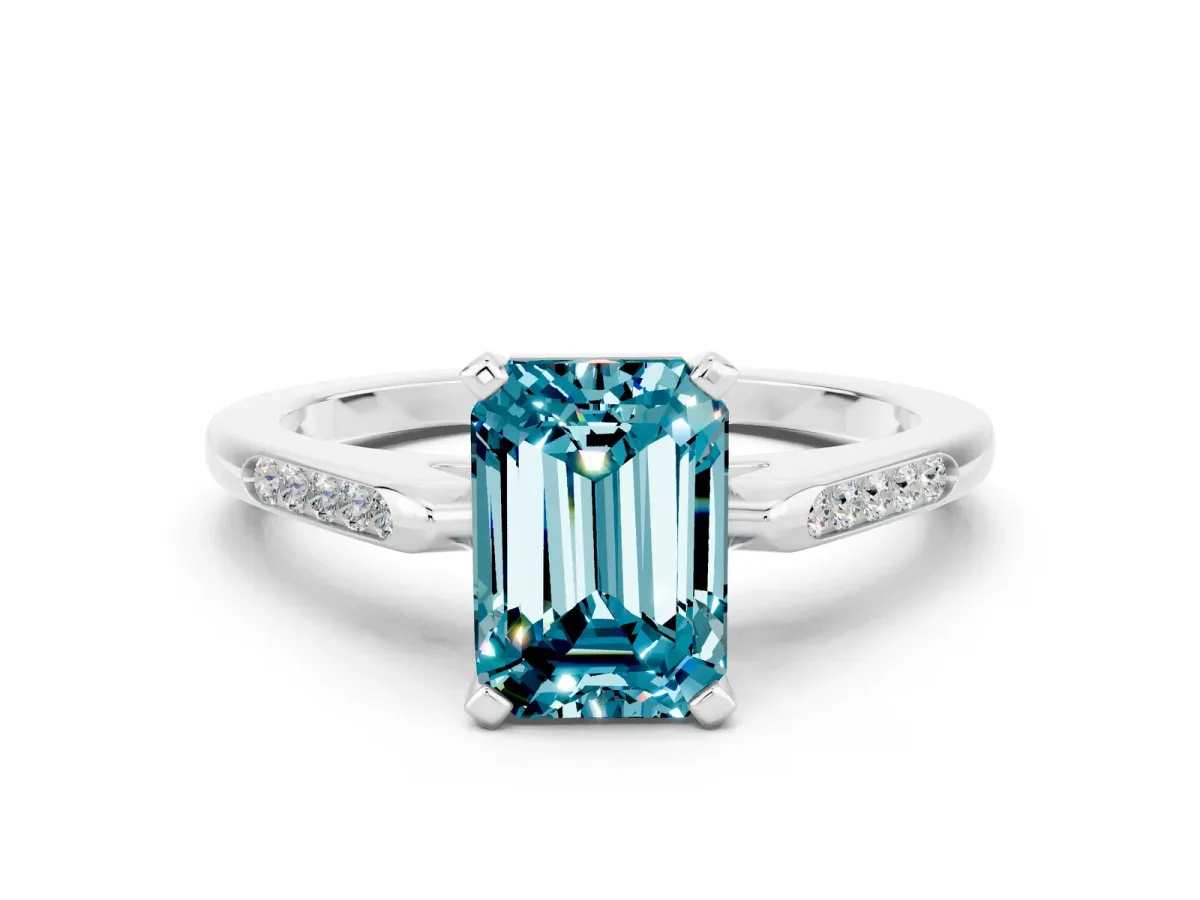 Emerald Cut Blue Topaz Solitaire Ring with Channel Set Round Band and Prong Setting Silver