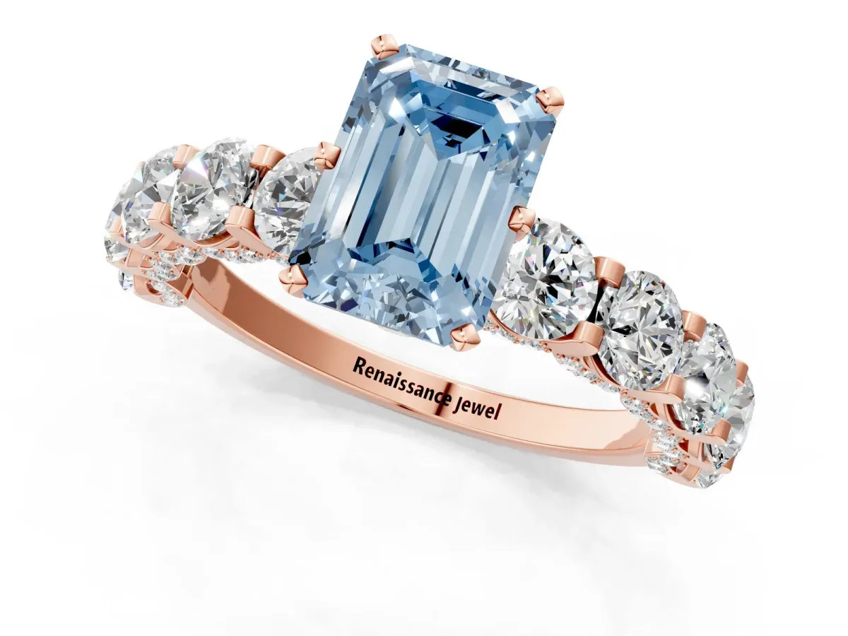 Fancy Blue Emerald Cut Diamond Side Stone Engagement Ring with Four-Prong Setting Rose gold