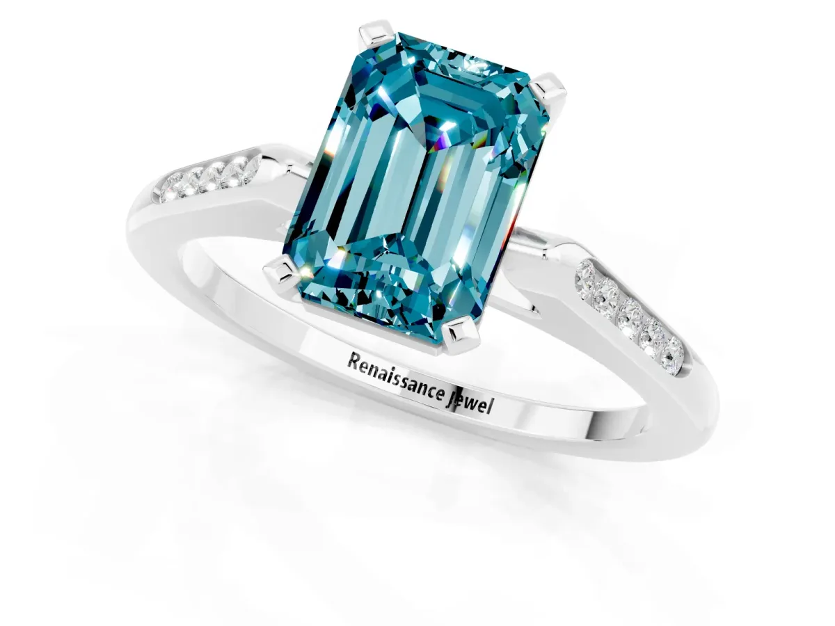 Emerald Cut Blue Topaz Solitaire Ring with Channel Set Round Band and Prong Setting Silver