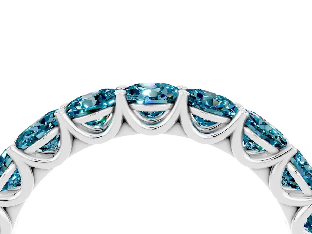 Round Blue Topaz Shared Prong Eternity Band Silver