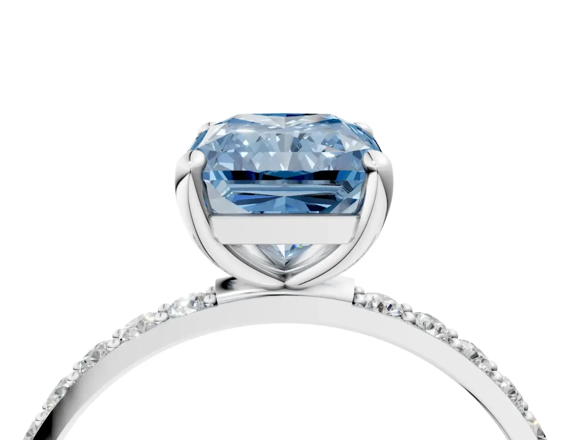 Fancy Blue Radiant Cut Diamond Solitaire Ring with Round Pavé Band and Prong Setting Silver