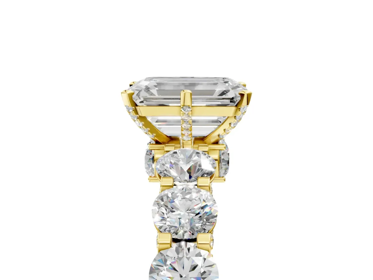 Emerald Cut Diamond Side Stone Engagement Ring with Four-Prong Setting Yellow gold