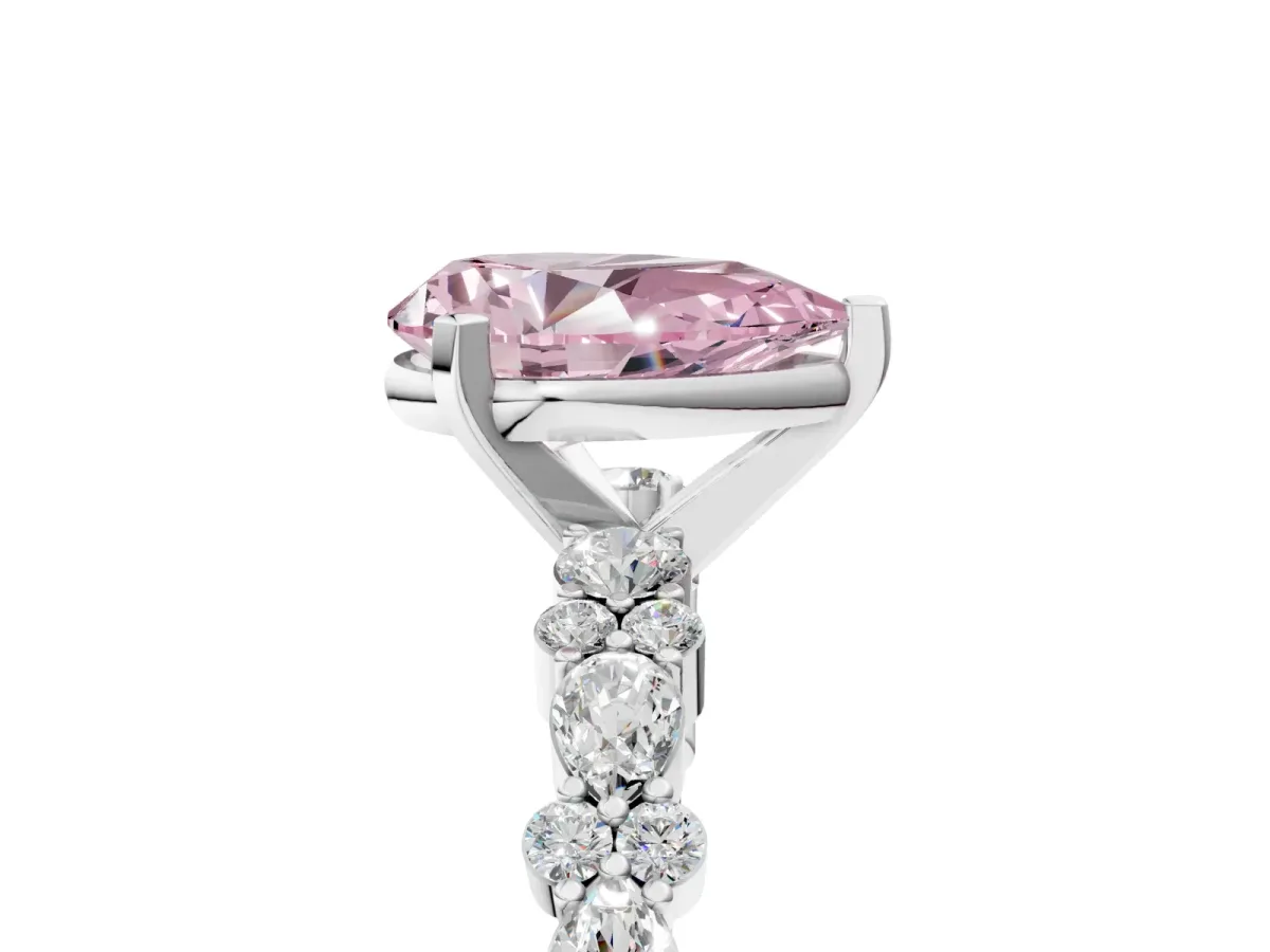 Fancy Pink Pear Cut Diamond Side Stone Solitaire Ring with Round and Four-Prong Setting White gold