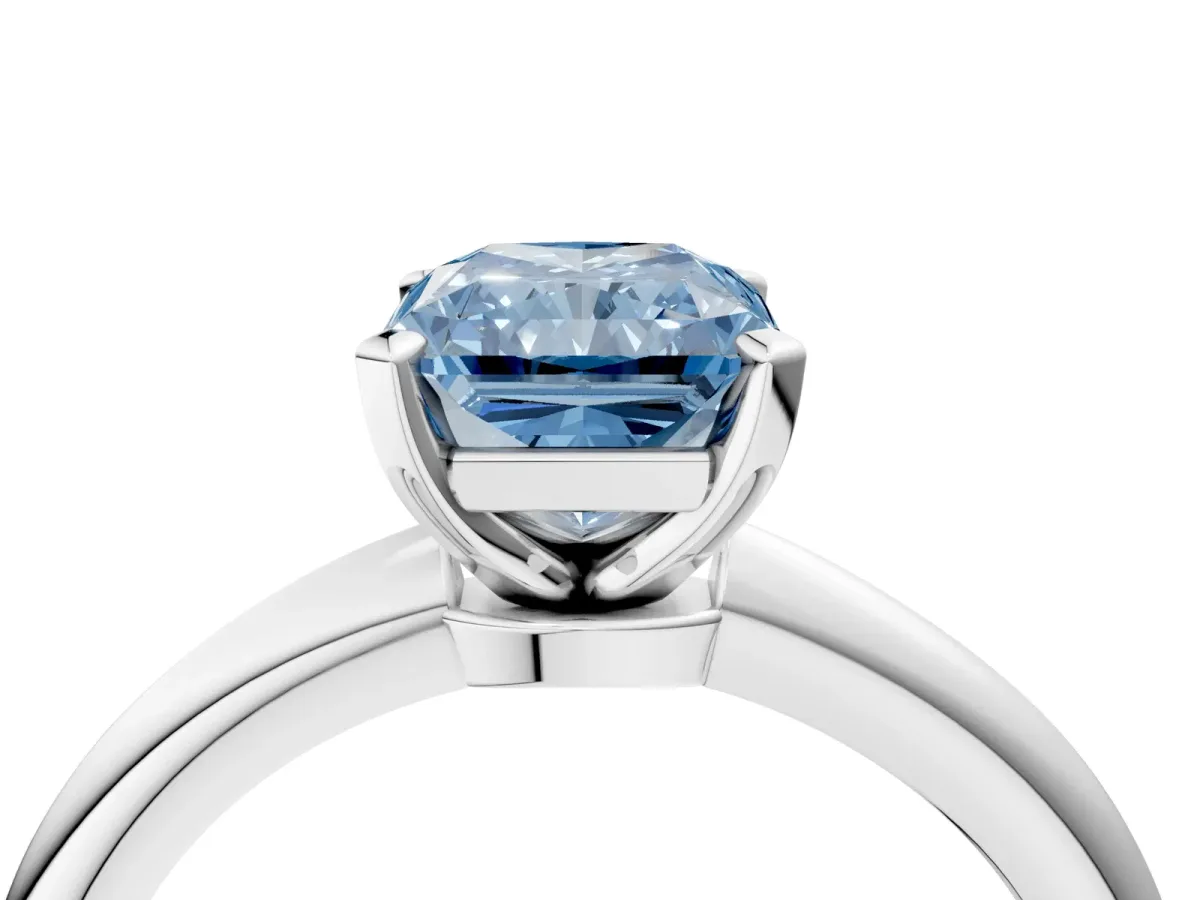 Fancy Blue Radiant Cut Diamond Solitaire Ring with Six-Prong Setting and Classic Band Silver