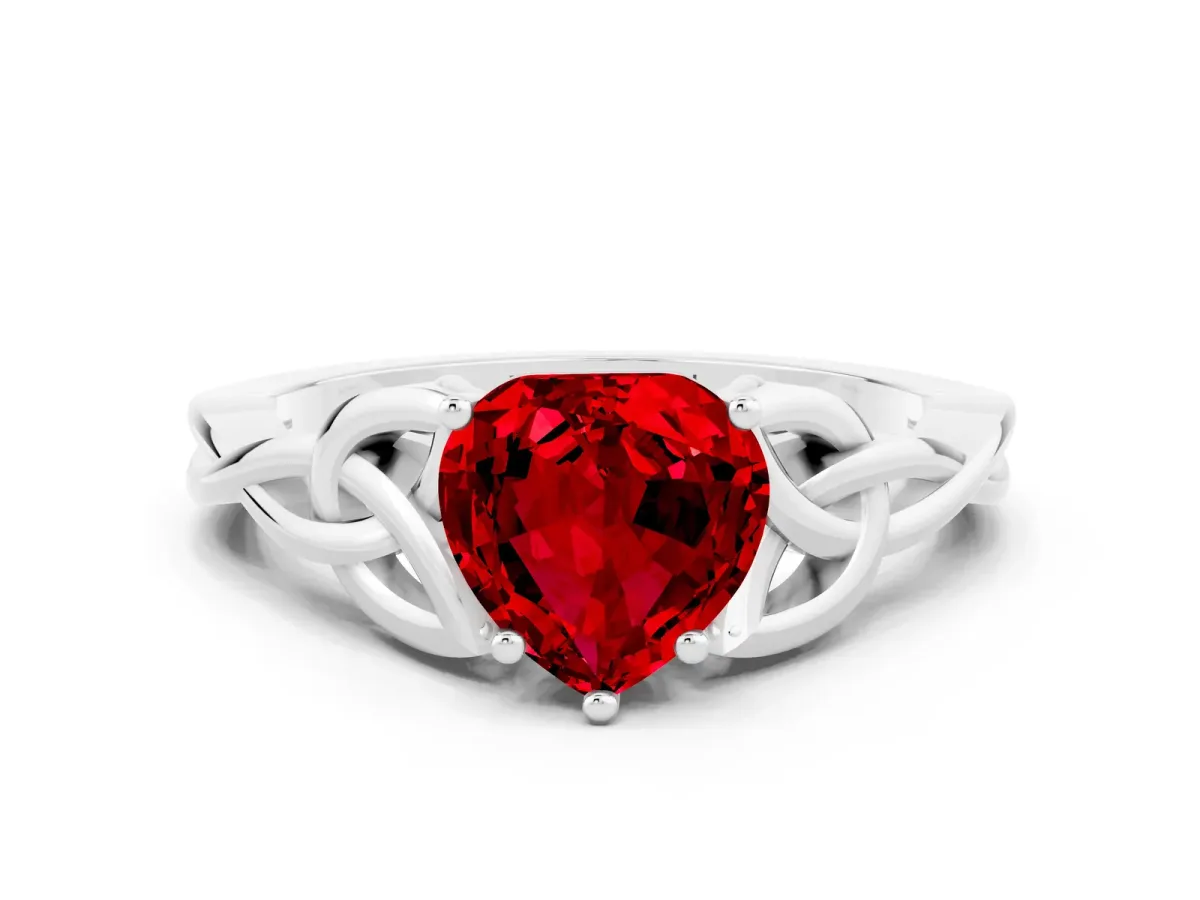 Heart Cut Ruby Solitaire Engagement Ring with Celtic Knot Band and Four-Prong Setting Silver