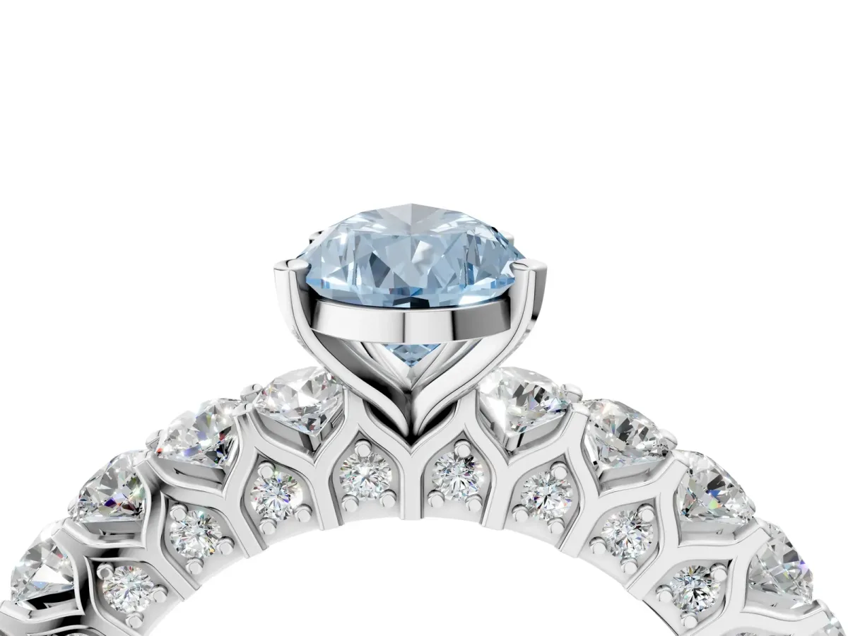 Fancy Blue Pear Cut Diamond Solitaire Ring with Shared Prong Pavé Band and Four-Prong Setting Silver