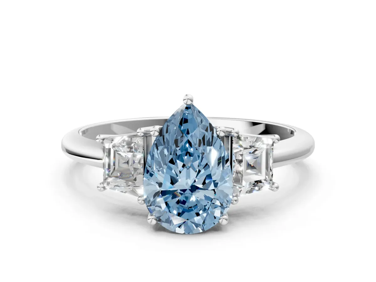 Fancy Blue Pear Cut Diamond Three-Stone Ring with Trapezoid Side Stones and Prong Setting Platinum