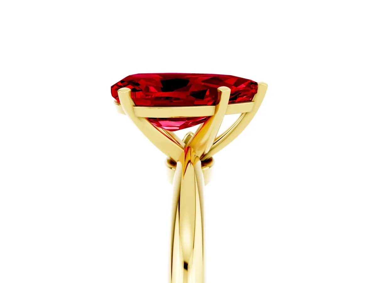 Pear Cut Ruby Solitaire Ring with Six-Prong Setting and Classic Band Yellow gold