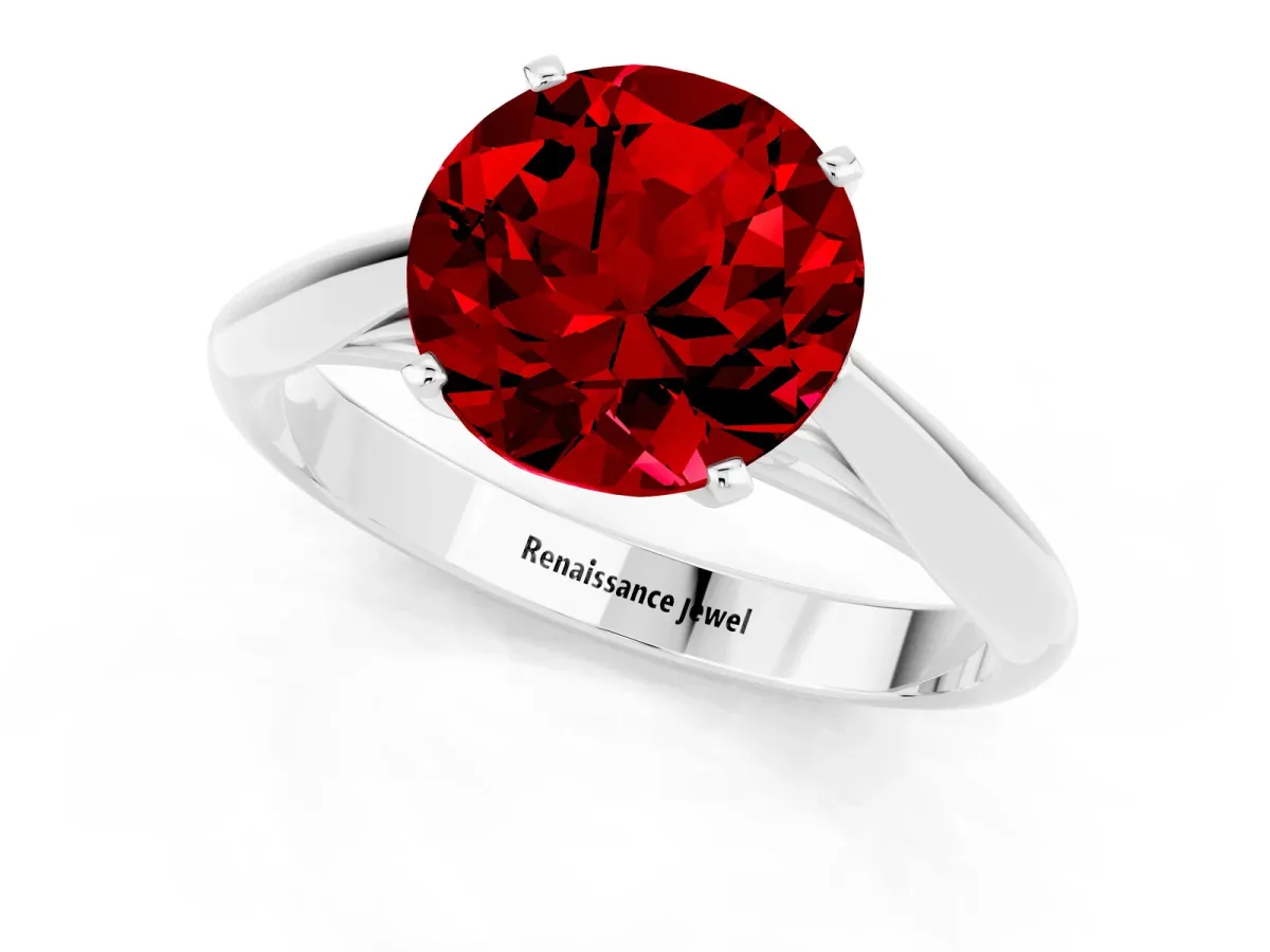 Round Cut Ruby Solitaire Engagement Ring with Cathedral Setting and Four-Prong Mount White gold