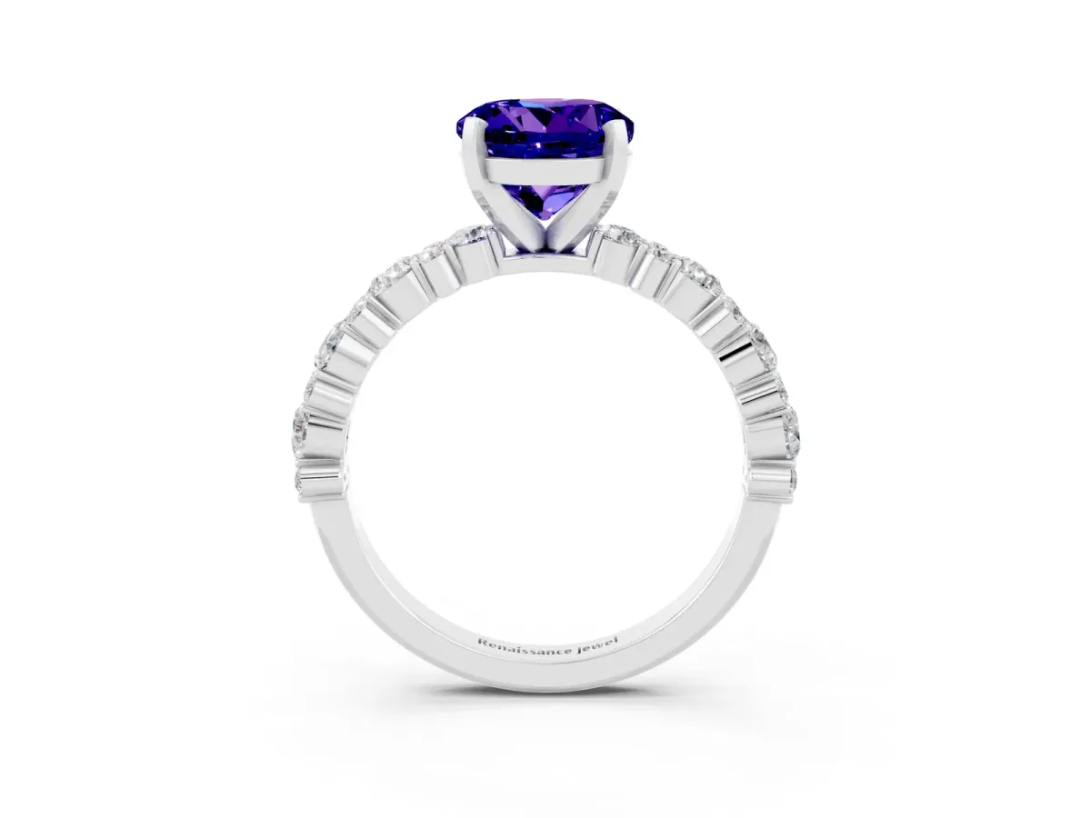 Round Cut Tanzanite Side Stone Solitaire Ring with Round and Four-Prong Setting Silver