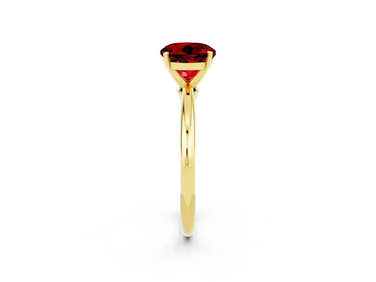 Round Cut Ruby Solitaire Ring with Six-Prong Setting and Classic Band Yellow gold