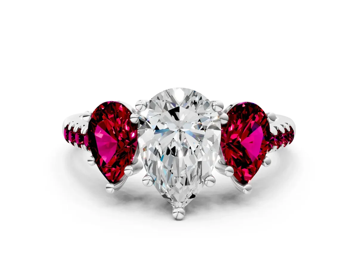 Three-Stone Pear Cut Diamond Ring with Round Garnet Pavé Band and Prong Setting Platinum