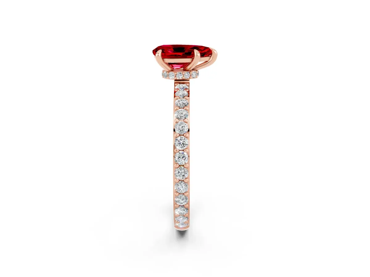 Pear Cut Ruby Solitaire Engagement Ring with Pavé Band and Four-Prong Setting Rose gold