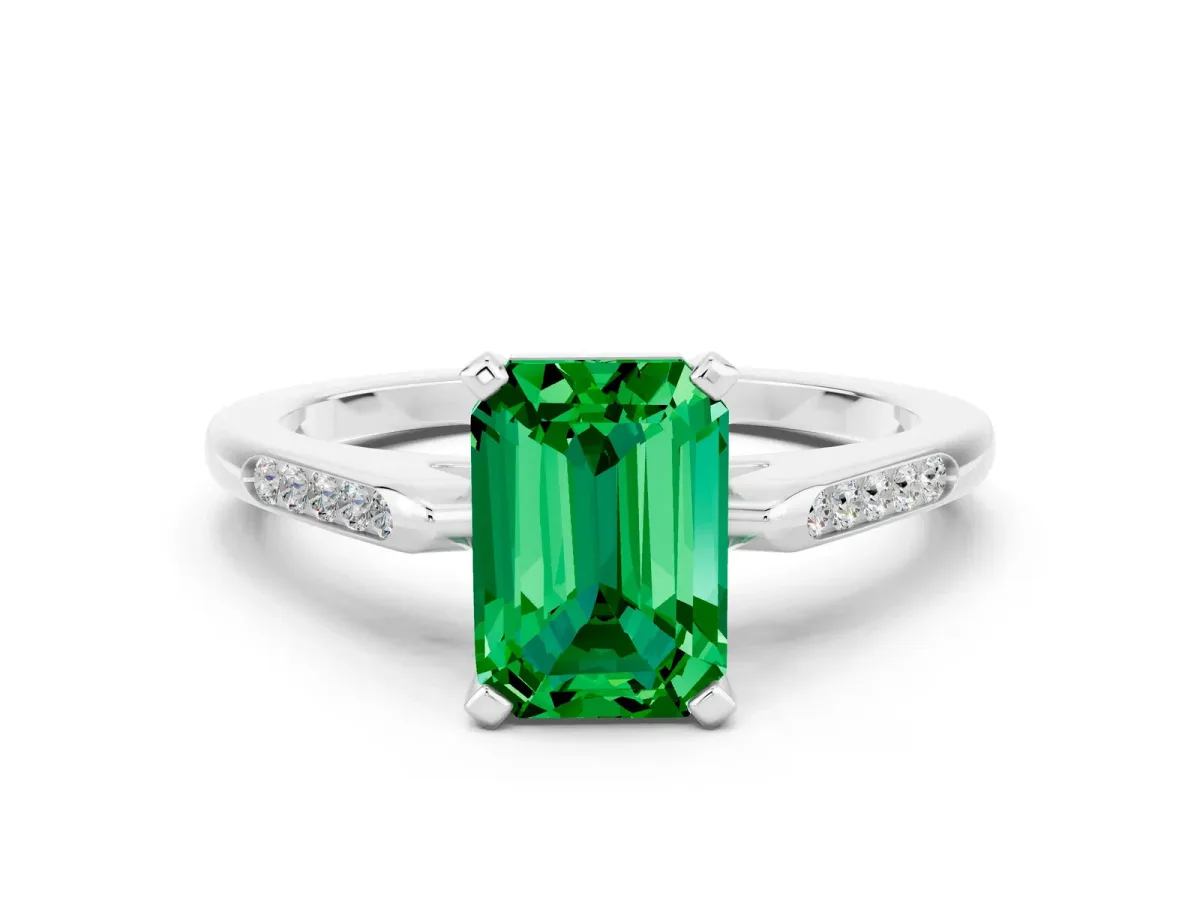 Emerald Cut Emerald Solitaire Ring with Channel Set Round Band and Prong Setting White gold