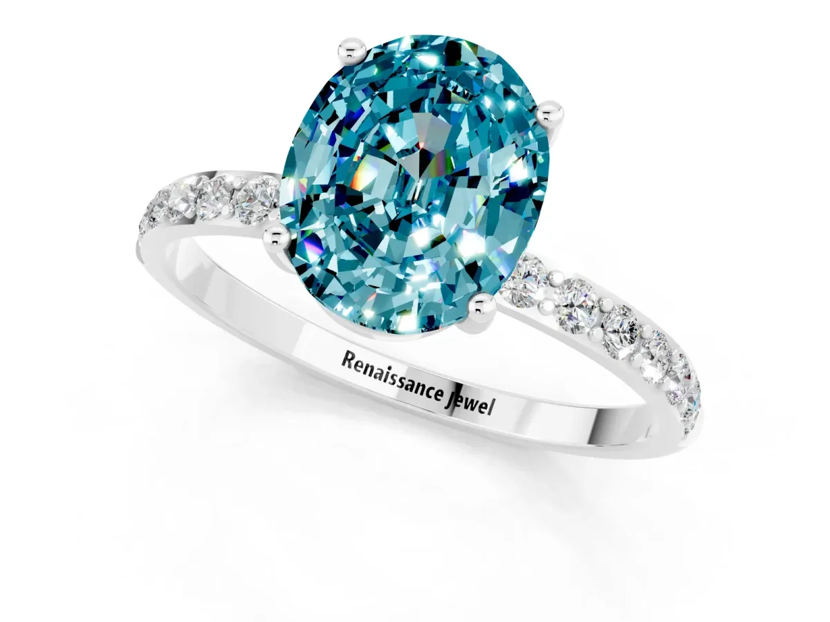 Oval Cut Blue Topaz Solitaire Ring with Round Pavé Band and Prong Setting Silver