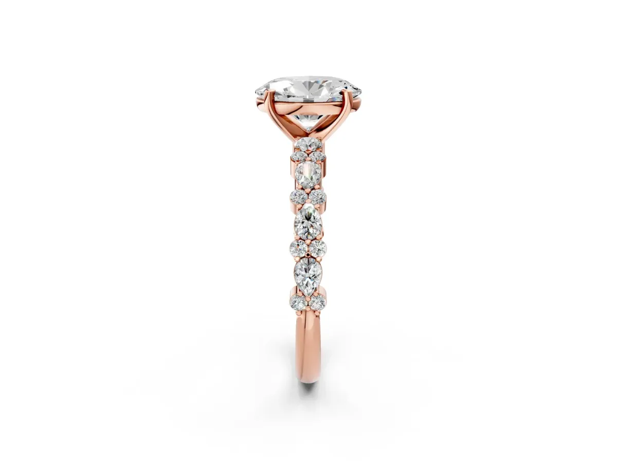 Oval Cut Diamond Side Stone Solitaire Ring with Round and Four-Prong Setting Rose gold