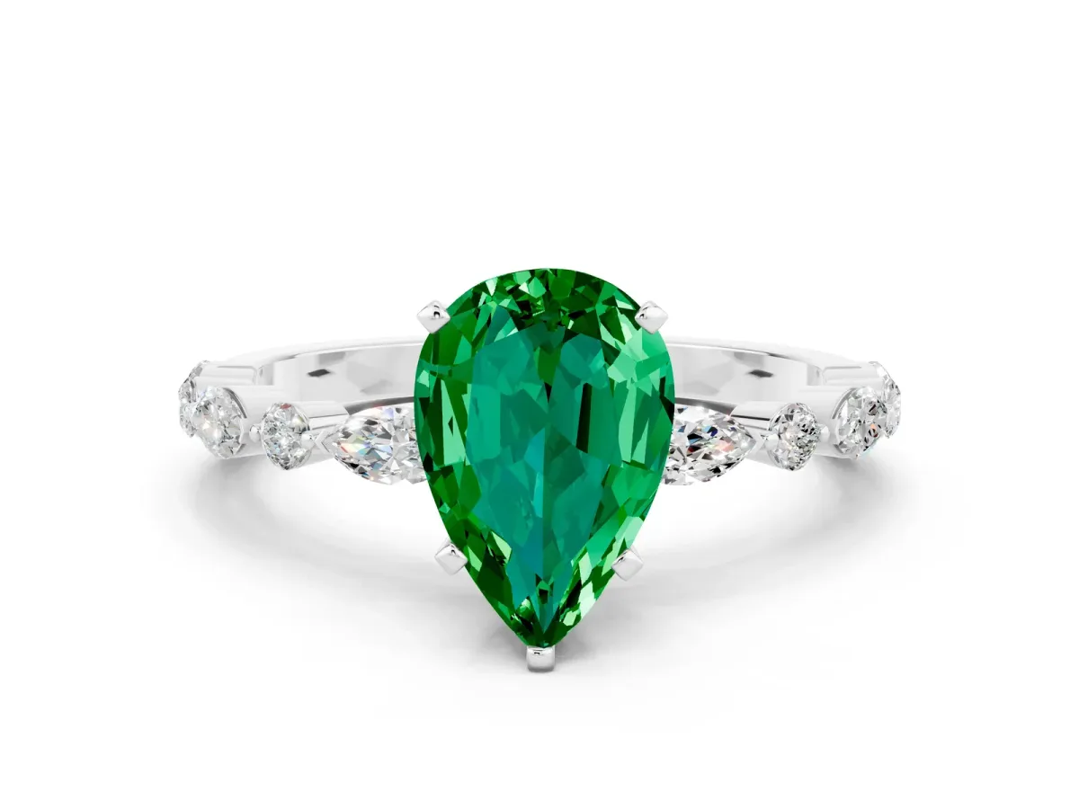 Pear Cut Emerald Ring with Marquise and Round Side Stones and Four-Prong Setting Silver