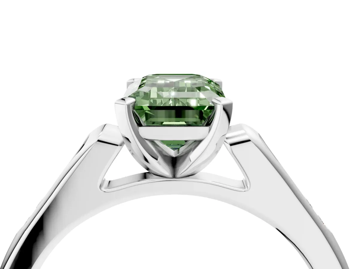 Fancy Green Emerald Cut Diamond Solitaire Ring with Channel Set Round Band and Prong Setting Silver