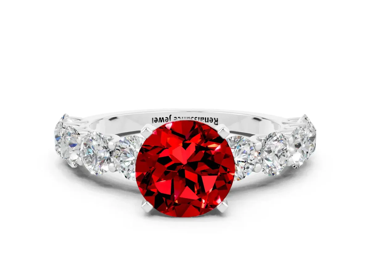 Round Cut Ruby Prong Setting with Side Stones on a Pave Band Platinum