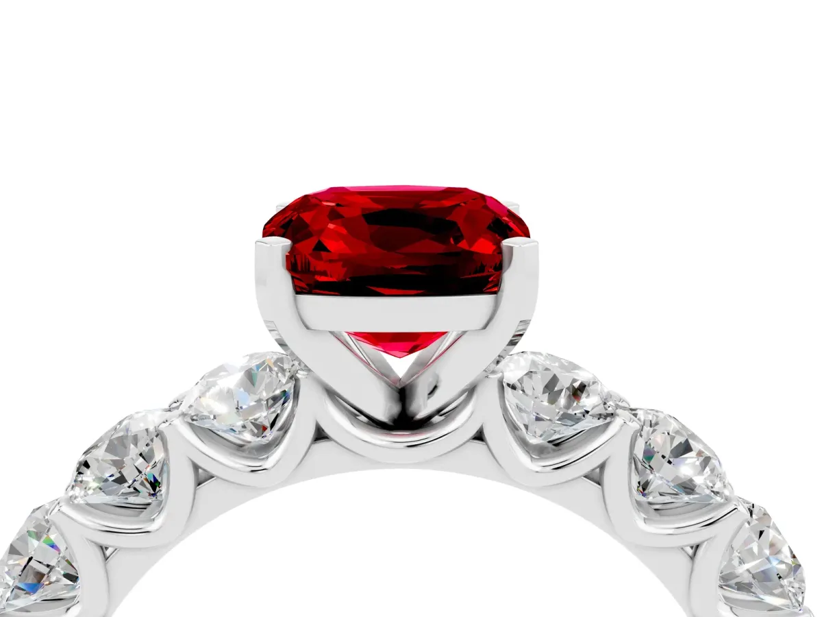 Cushion Cut Ruby Prong Setting with Side Stones on a Pave Band Silver