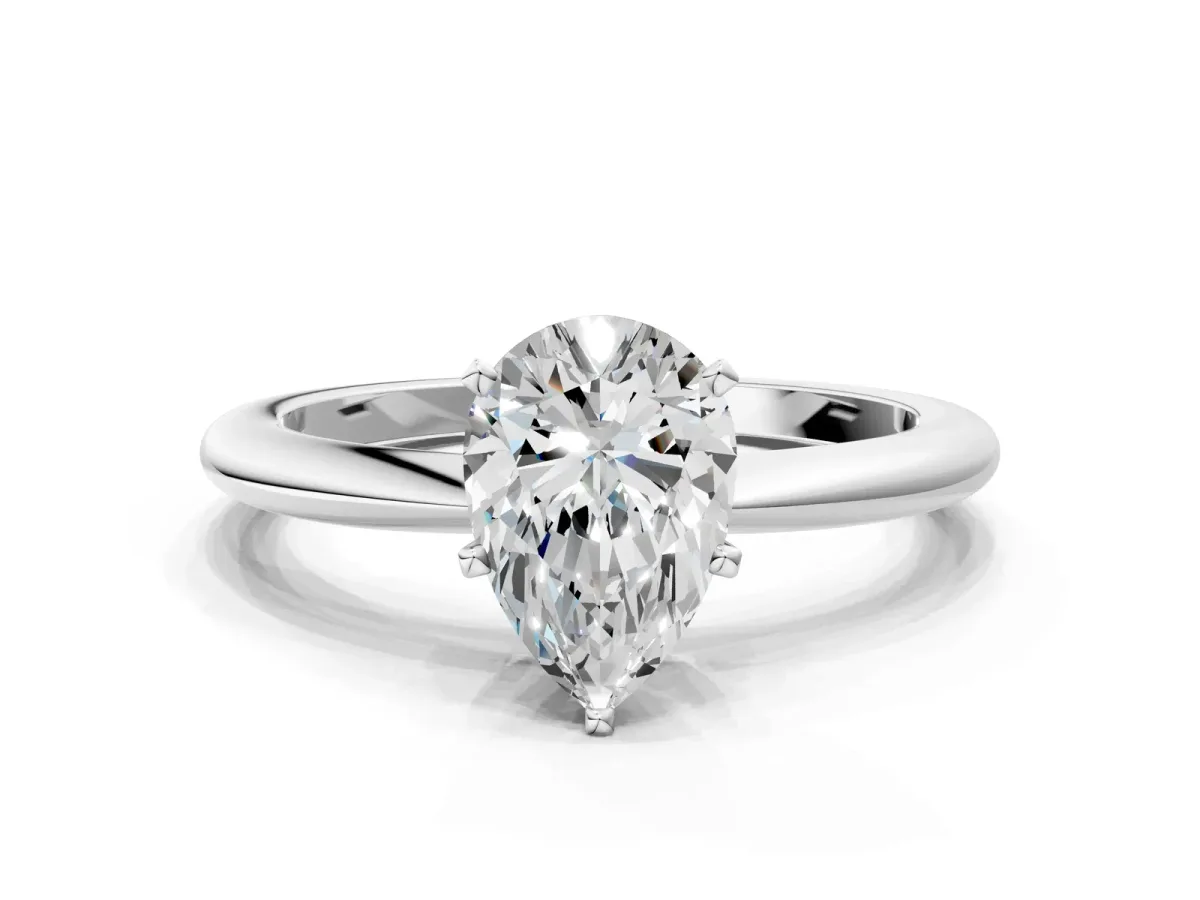Pear Cut Diamond Solitaire Ring with Six-Prong Setting and Classic Band Silver