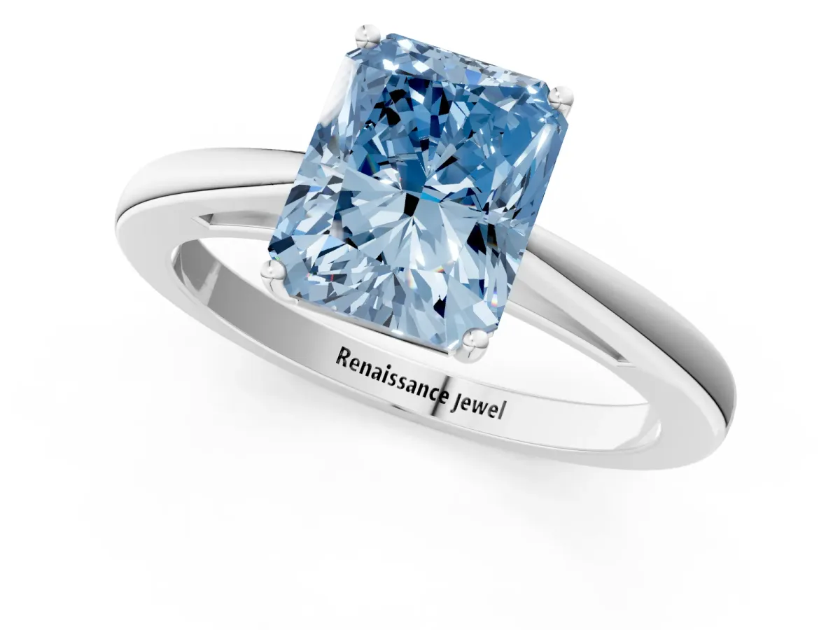 Fancy Blue Radiant Cut Solitaire Diamond Ring with Split Shank and Four-Prong Setting Platinum