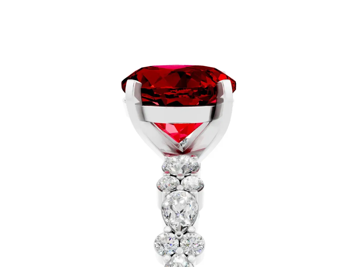 Round Cut Ruby Side Stone Solitaire Ring with Round and Four-Prong Setting White gold