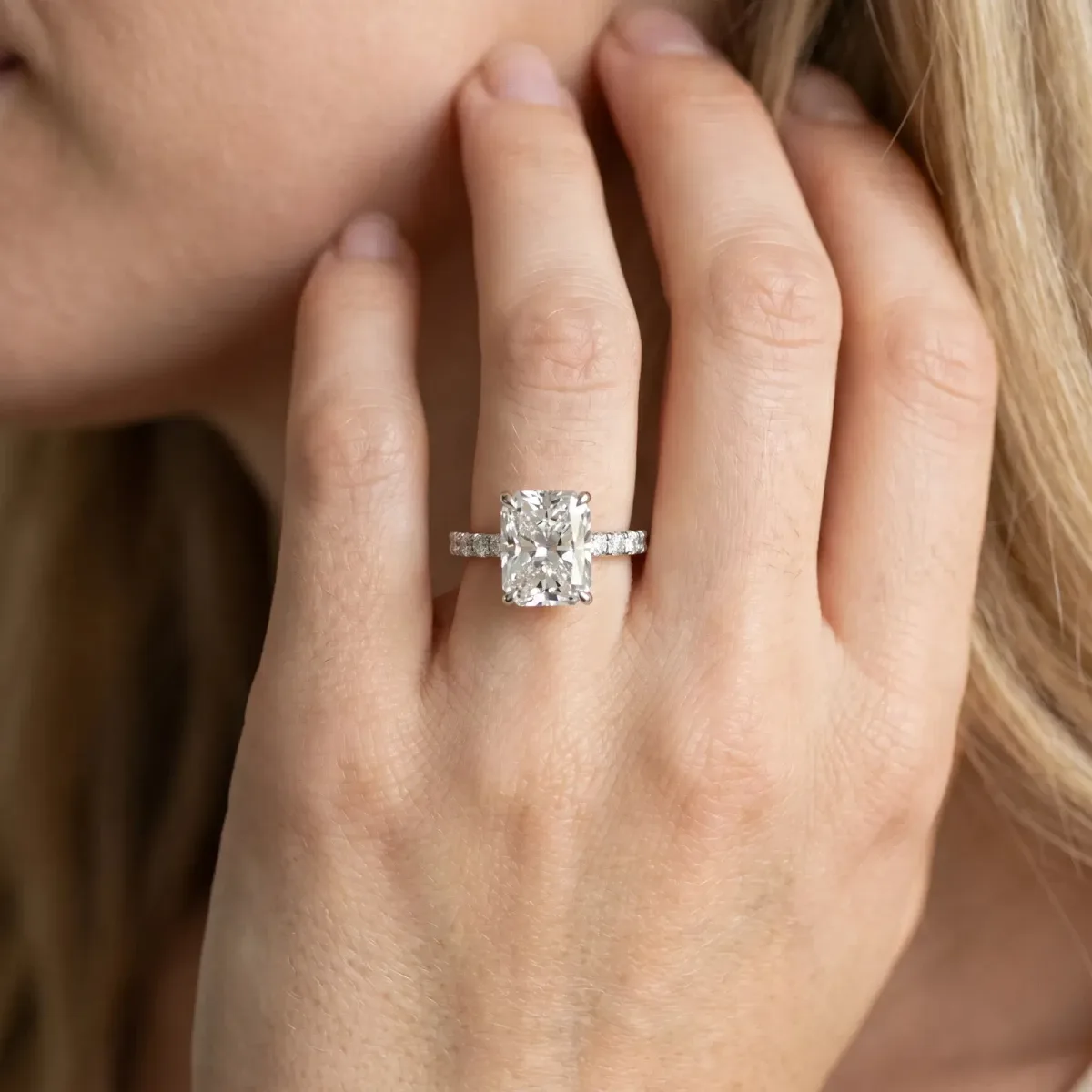 Radiant Cut Diamond Solitaire Ring with Round Pavé Band and Four-Prong Setting Silver