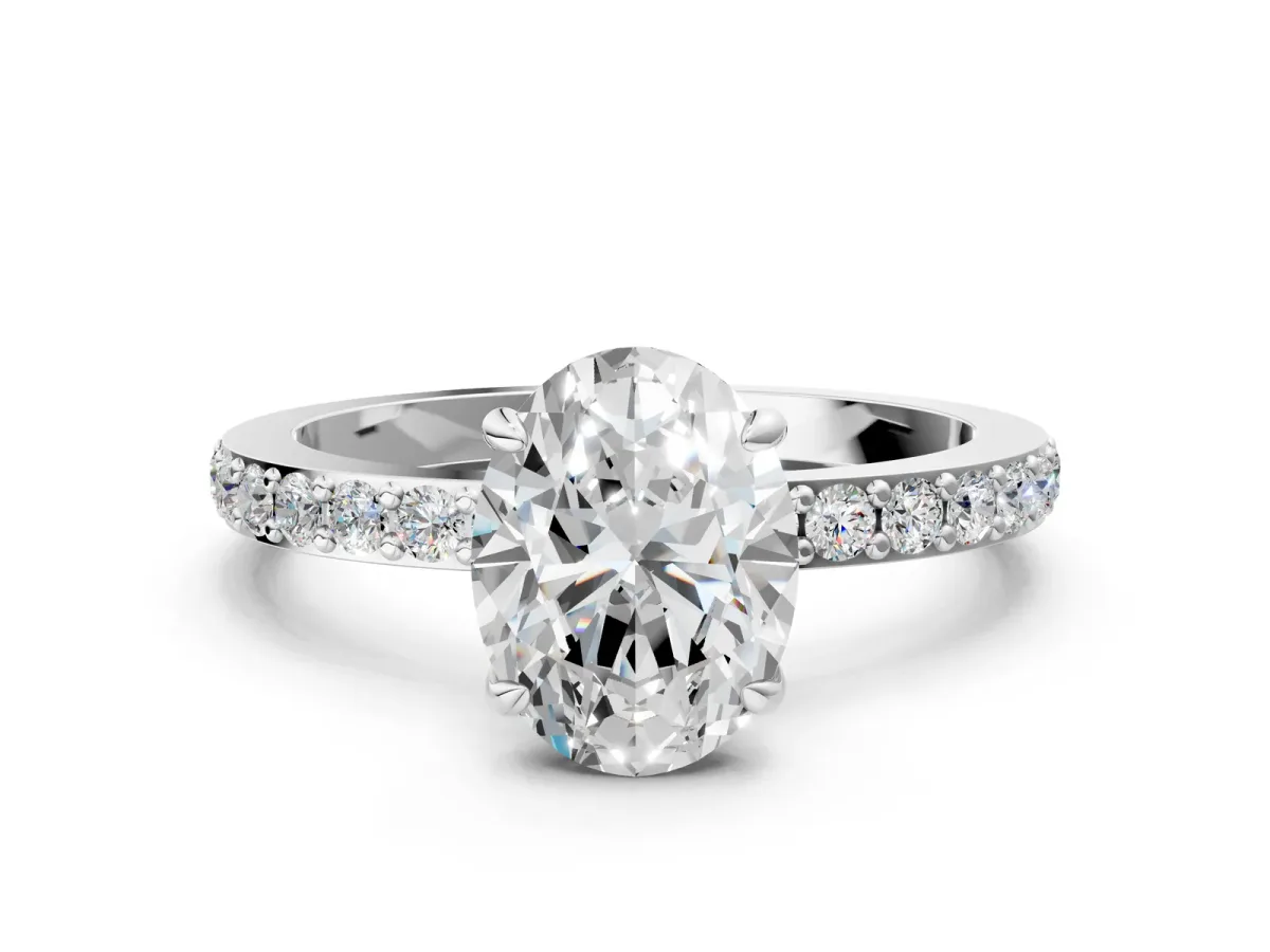 Oval Cut Diamond Solitaire Engagement Ring with Pavé Band and Four-Prong Setting Silver