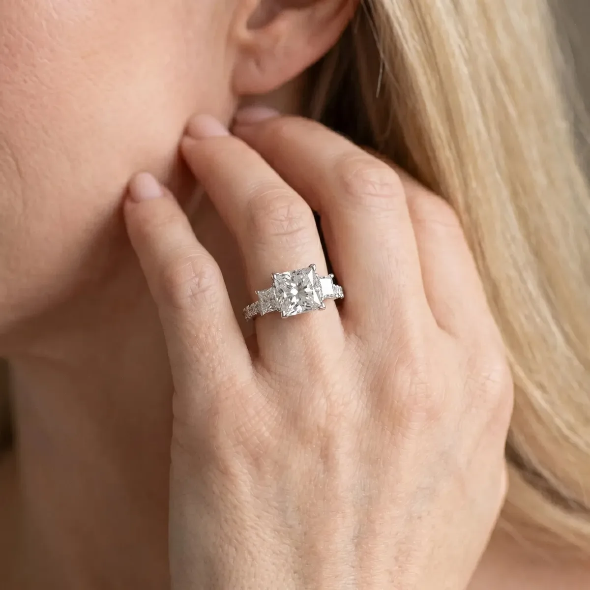 Three-Stone Princess Cut Diamond Ring with Round Pavé Band and Prong Setting Platinum