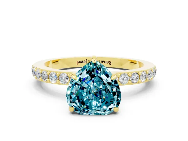 Heart Cut Blue Topaz Solitaire Engagement Ring with Pavé Band and Four-Prong Setting Yellow gold